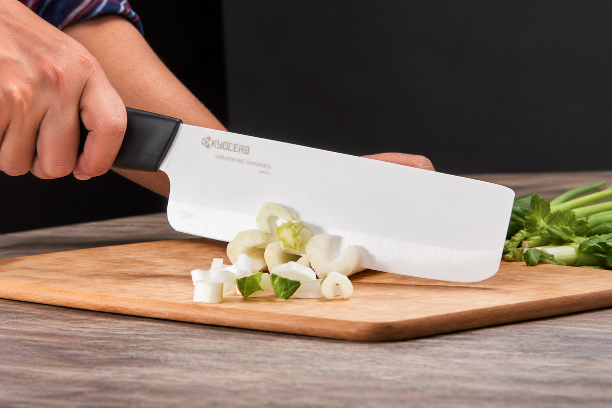 Kyocera Advanced Ceramic Revolution Series 6-inch Nakiri Vegetable Cleaver, Black Handle, White Blade