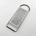 TableCraft SG206BH, 12.25" x 4.25" Stainless Steel Flat Grater, Extra Coarse Holes for Shredding Cheese and Vegetables, Compact and Easy to Store, Dishwasher Safe